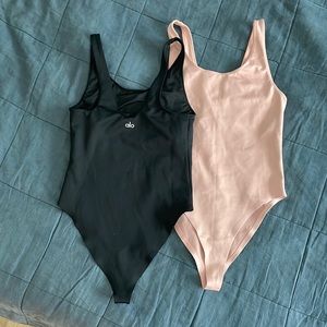 Set of 2 ALO yoga bodysuits medium pink black swimsuits